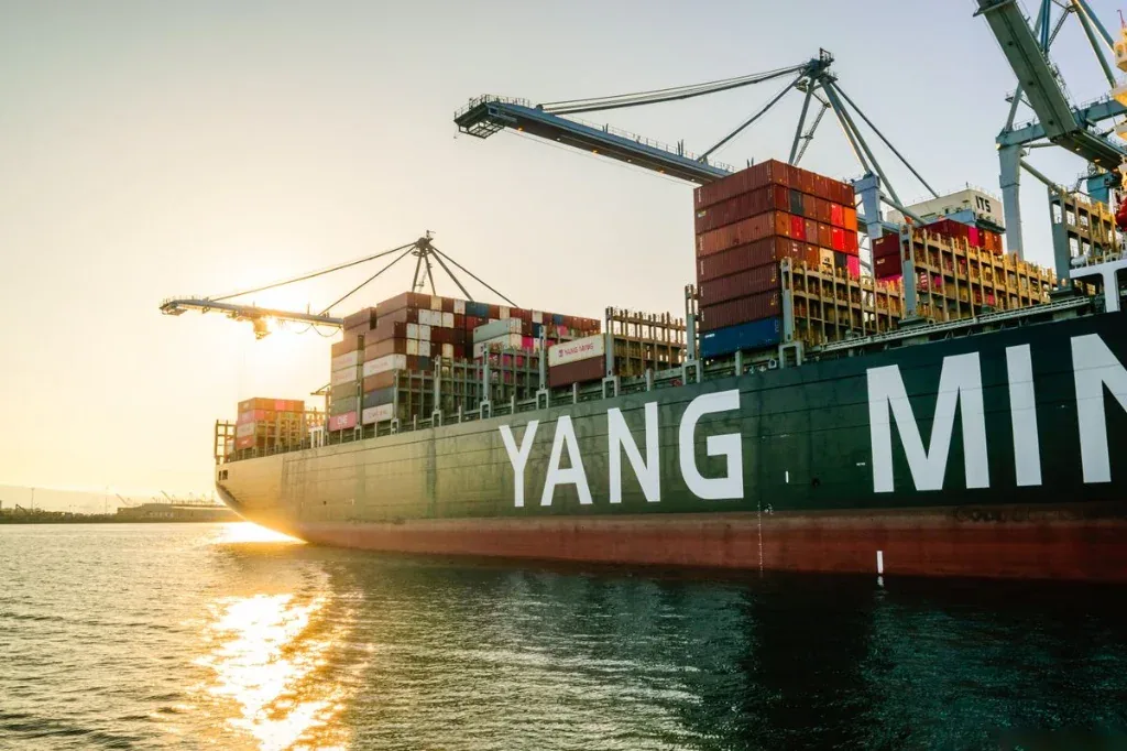Container cargo ship berthed at a commercial port terminal