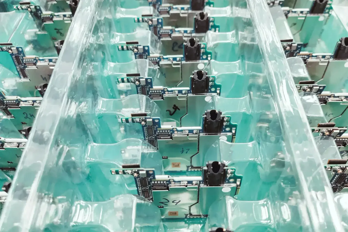 Electronic circuit boards arranged along a clean assembly line