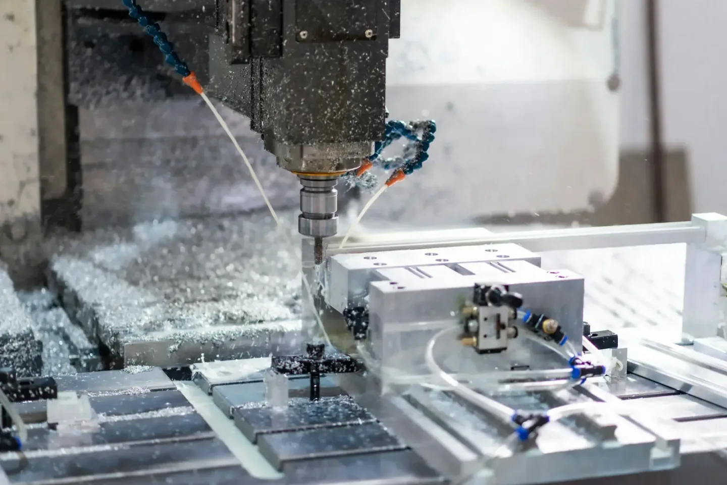CNC machining equipment milling an aluminium industrial component