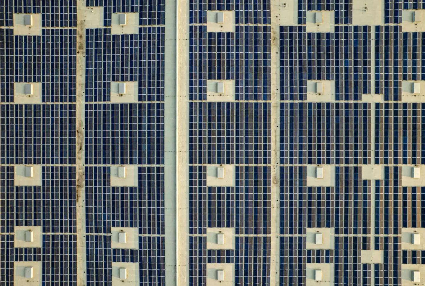 Solar photovoltaic panels installed across a commercial facility rooftop
