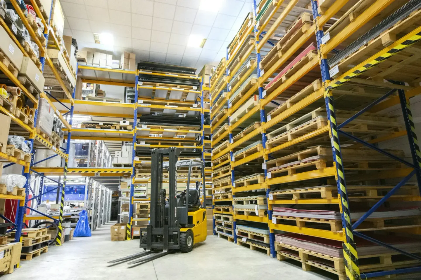 Organised pallet storage racks inside a logistics warehouse